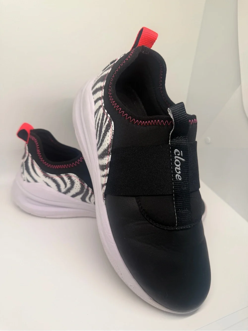 clove Women's Black Slip-On Sneakers with Neon Pink Accents